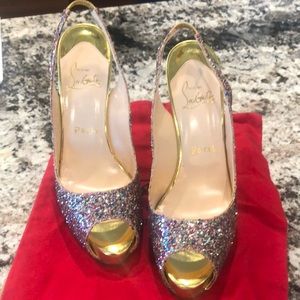 Christian Louboutin peep toe pumps